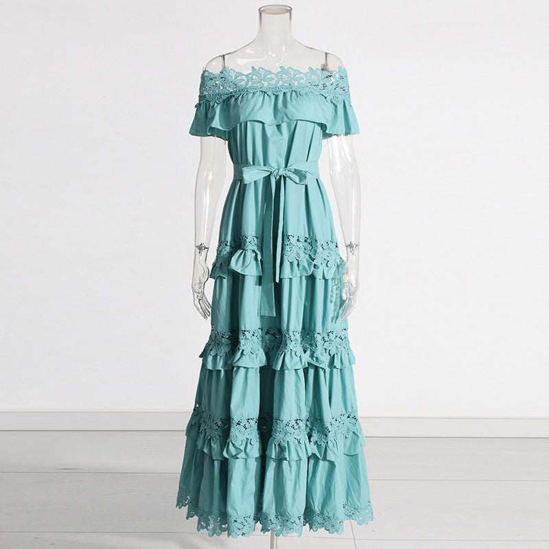 A solid color dress for women with a ruffled edge, one shoulder, waist, and lace hem