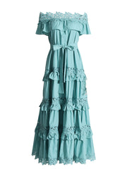 A solid color dress for women with a ruffled edge, one shoulder, waist, and lace hem